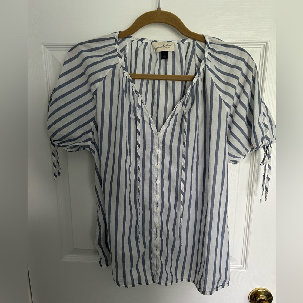 Size large blue and off white blouse.